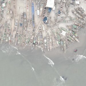 Boats Shore Beach Community Settlement Fishing Top Down Pan View