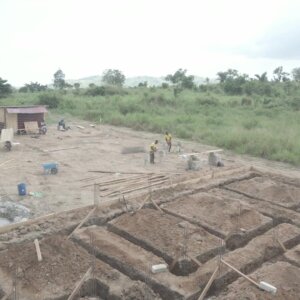 Construction Workers Mixing Mortar