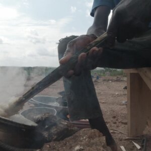 Driving Banku Food Construction Site Coal Pot