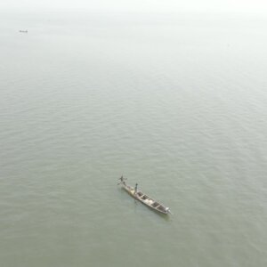 Fishing Boat Near Ferry Orbit