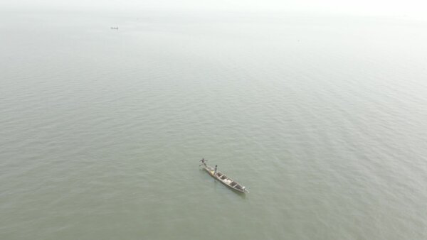 Fishing Boat Near Ferry Orbit