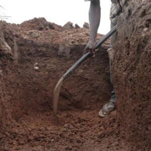 Laborer Digging Foundation Building Shoveling Dirt