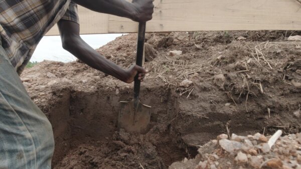 Laborer Digging Foundation Building Shoveling