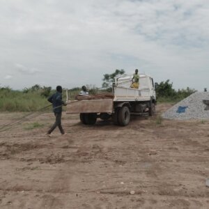 Offloading Iron Rod From Truck On Site Construction