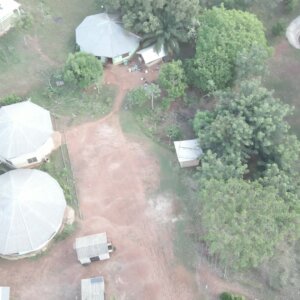 Remote Settlement Community Houses Forest Top Down View Orbit Arc