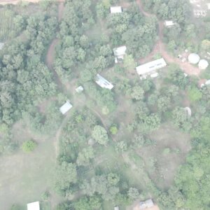 Remote Settlement Community Houses Forest Top Down View