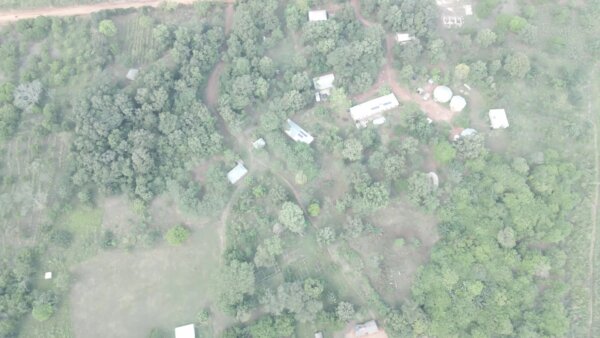 Remote Settlement Community Houses Forest Top Down View