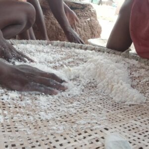 Woman Two Hands Seive Dry Cassava Dough Gari