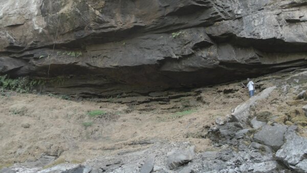 Akumersu Waterfalls Man Explores Huge Rocks Cliff