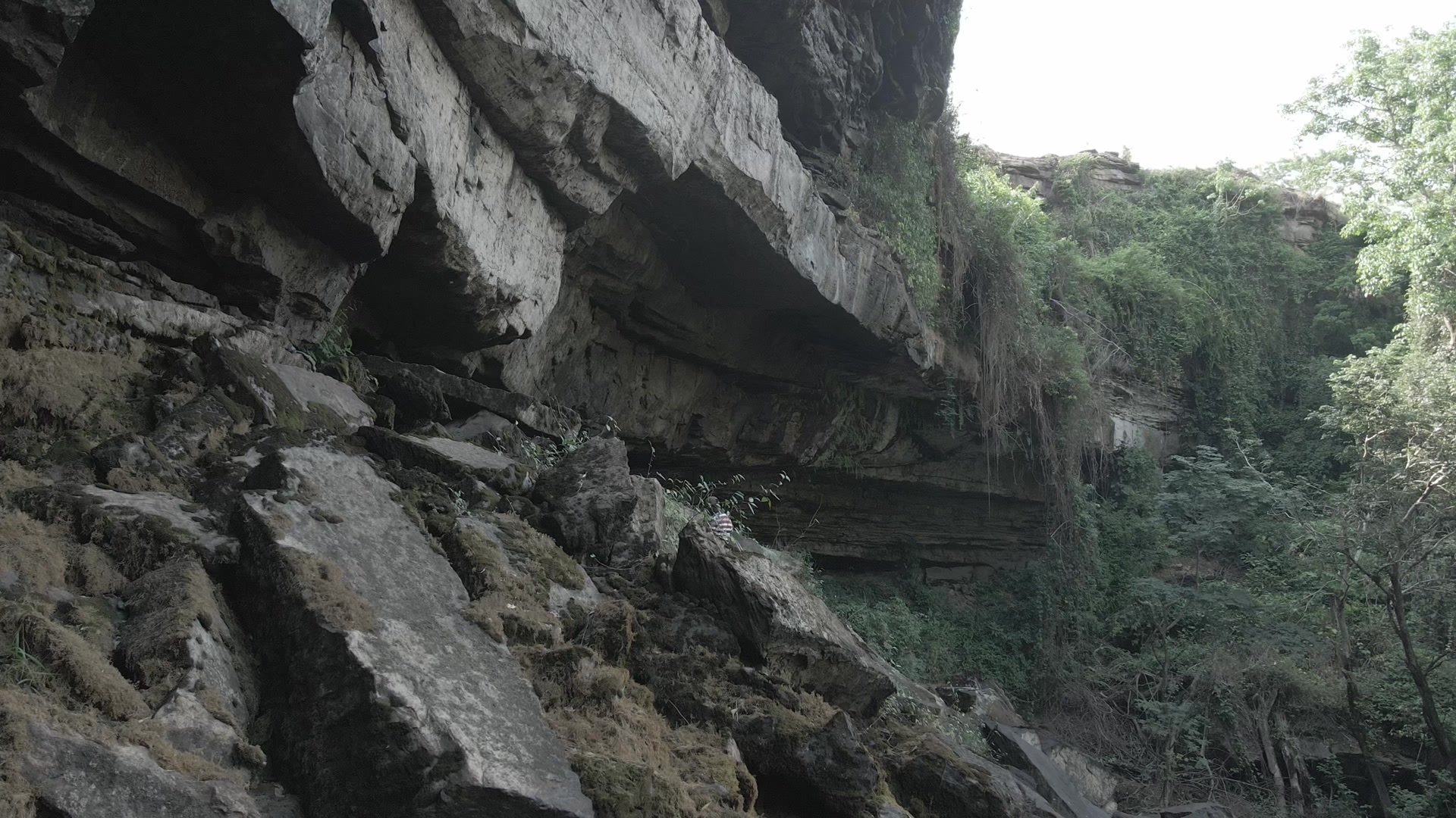 Akumersu Waterfalls Reveal Huge Rock Cliff Man Stands On Rocks